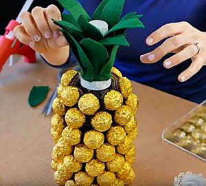 Try this cheap easy Pineapple Champagne Bottle Ferrero Roche Chocolate Candy DIY Gift Idea