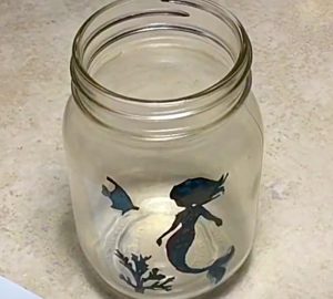 Glue A Mermaid Silhouette Inside A Mason Jar To Make A Mermaid Luminary