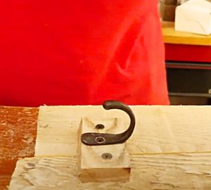 Use A Coat Hook To Make A Rustic Mason Jar Light Hanger
