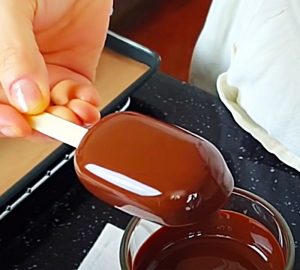 Dip Condensed Milk Ice Cream Bars In Melted Chocolate