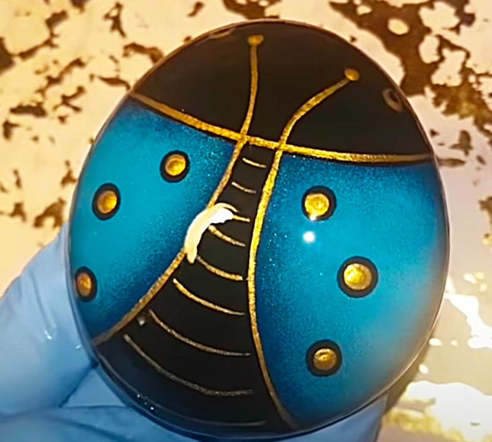 Cover The Painted Scarab Rocks with Resin To Make Them Shine