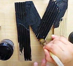 Paint Paper Mache Letters with Black Craft Paint